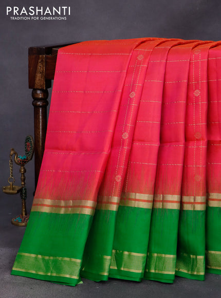 Pure soft silk saree dual shade of pink and green with allover zari checks & buttas and rettapet zari woven border