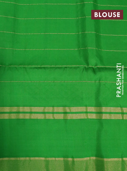 Pure soft silk saree dual shade of pink and green with allover zari checks & buttas and rettapet zari woven border