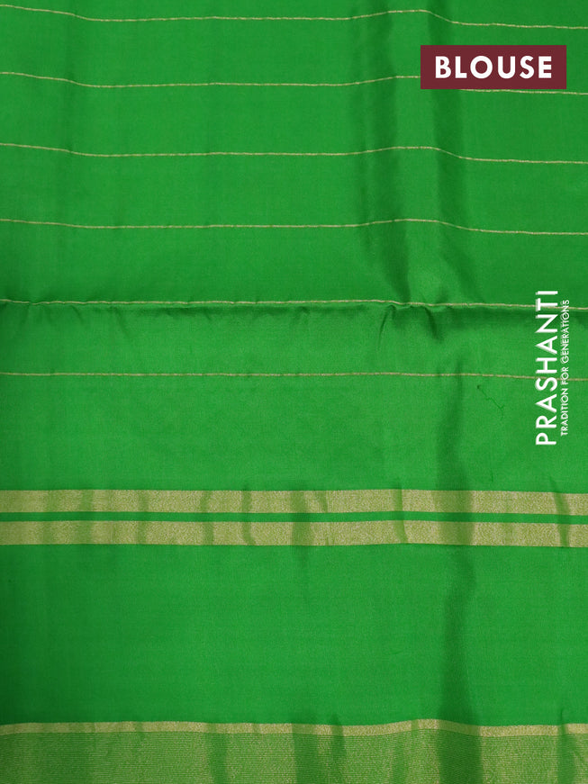 Pure soft silk saree dual shade of pink and green with allover zari checks & buttas and rettapet zari woven border