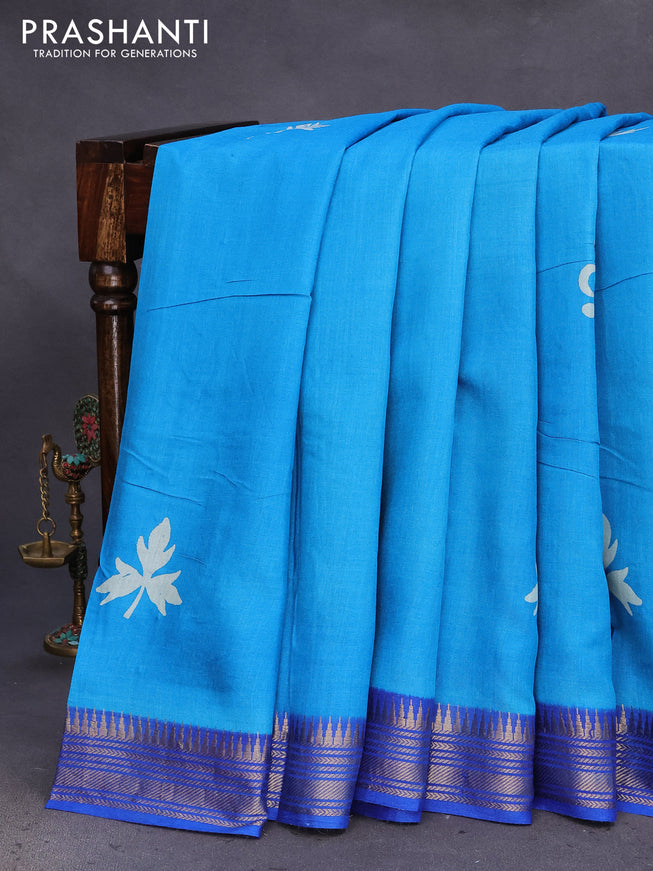 Munga tussar silk saree cs blue and blue with leaf butta prints and zari woven border