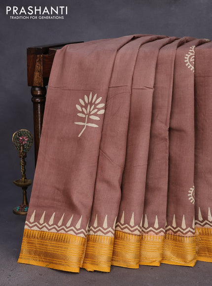 Munga tussar silk saree brown shade and mustard yellow with butta prints and zari woven border