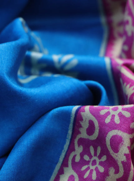 Munga tussar silk saree cs blue and grey with paisley butta prints and zari woven border