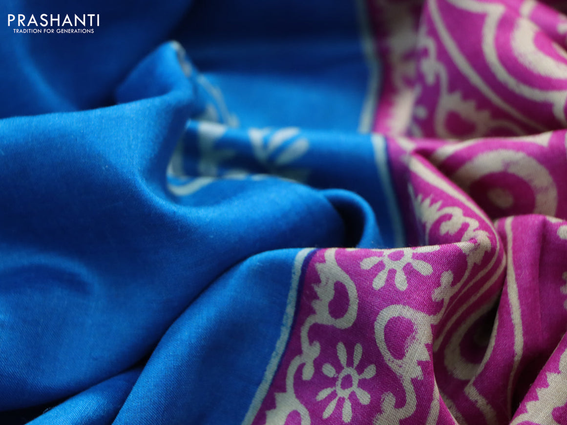 Munga tussar silk saree cs blue and grey with paisley butta prints and zari woven border