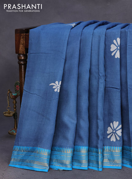 Munga tussar silk saree blue shade and cs blue with floral butta prints and zari woven border