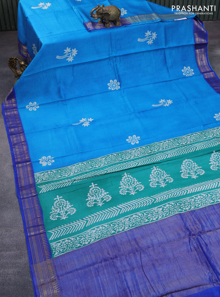 Munga tussar silk saree cs blue and blue with floral butta prints and zari woven border