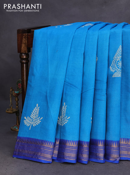 Munga tussar silk saree cs blue and blue with butta prints and zari woven border