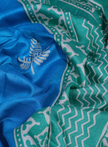 Munga tussar silk saree cs blue and blue with butta prints and zari woven border