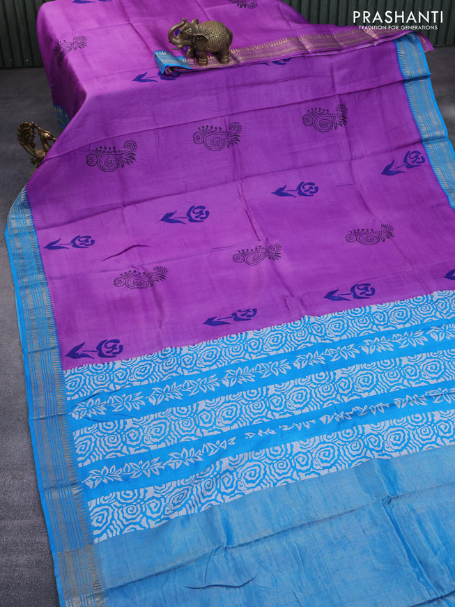 Munga tussar silk saree purple shade and cs blue with floral butta prints and zari woven border