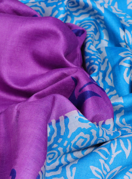 Munga tussar silk saree purple shade and cs blue with floral butta prints and zari woven border