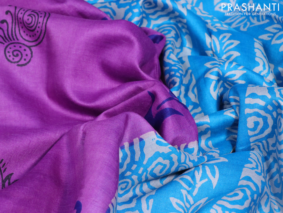 Munga tussar silk saree purple shade and cs blue with floral butta prints and zari woven border