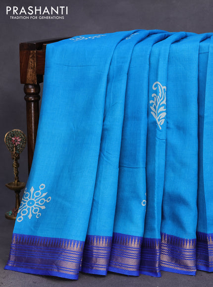 Munga tussar silk saree cs blue and blue with butta prints and zari woven border