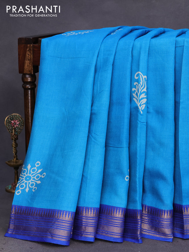 Munga tussar silk saree cs blue and blue with butta prints and zari woven border