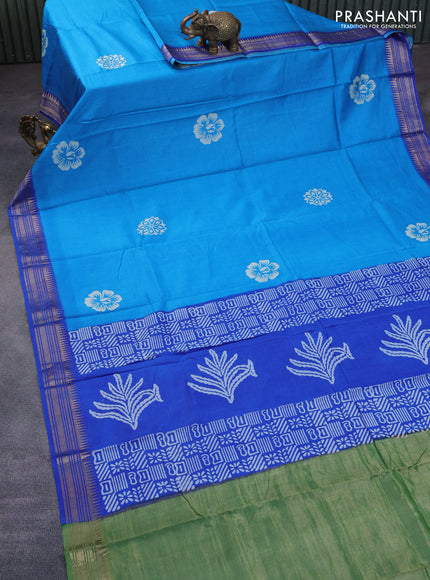 Munga tussar silk saree cs blue and blue with floral butta prints and zari woven border