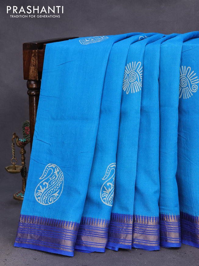 Munga tussar silk saree cs blue and blue with butta prints and zari woven border