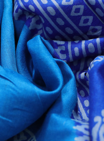 Munga tussar silk saree cs blue and blue with butta prints and zari woven border