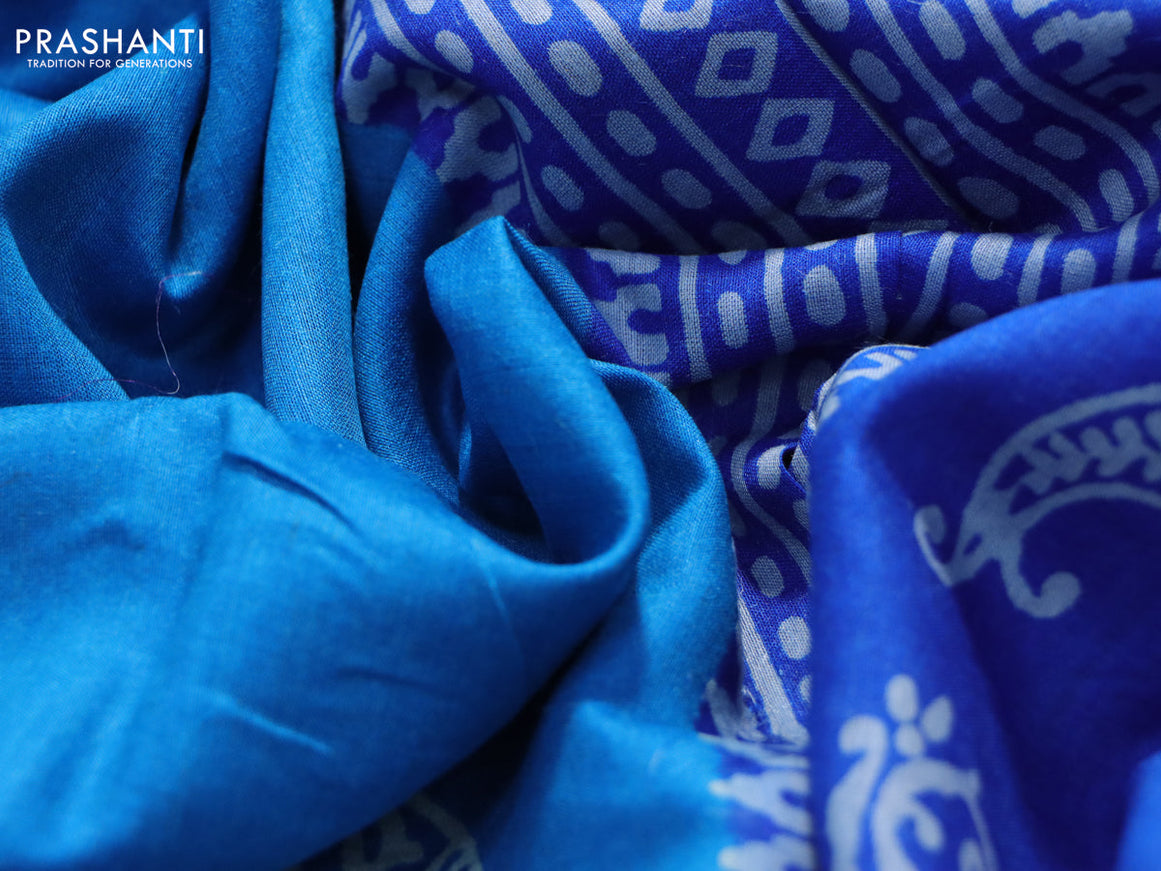 Munga tussar silk saree cs blue and blue with butta prints and zari woven border