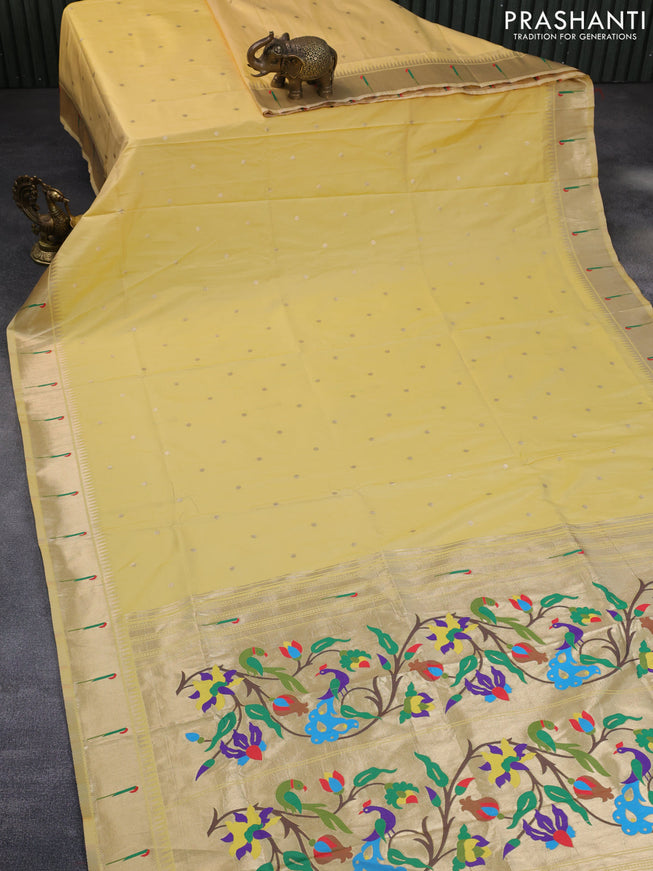 Semi paithani saree pale yellow with zari woven buttas and zari woven muniya butta border