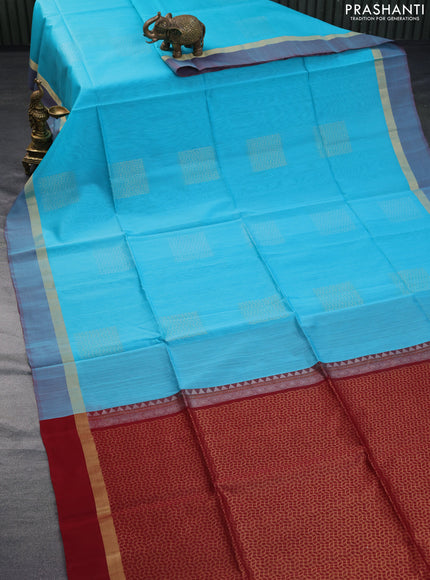 Kora silk cotton saree light blue and maroon with zari woven buttas and zari woven simple border