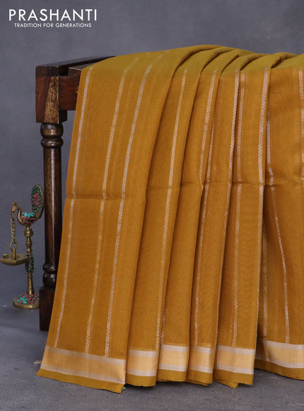 Kora silk cotton saree mustard shade with silver & gold zari weaves and zari woven border