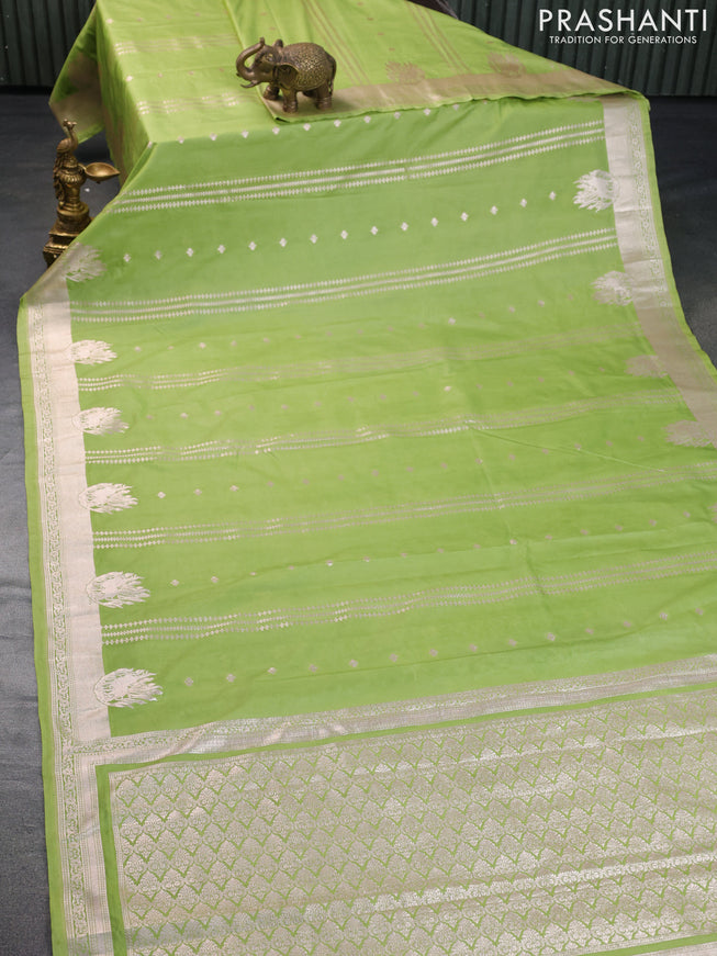 Banarasi semi katan silk saree light green with allover zari weaves and zari woven border