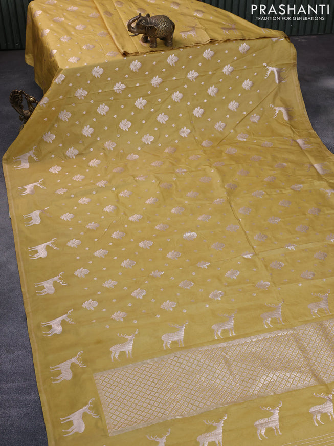 Banarasi semi katan silk saree yellow shade with zari woven floral buttas and zari woven butta border