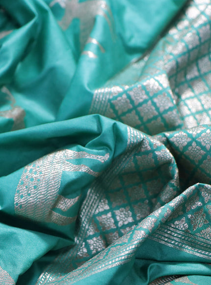 Banarasi semi katan silk saree teal blue with zari woven floral buttas and zari woven butta border