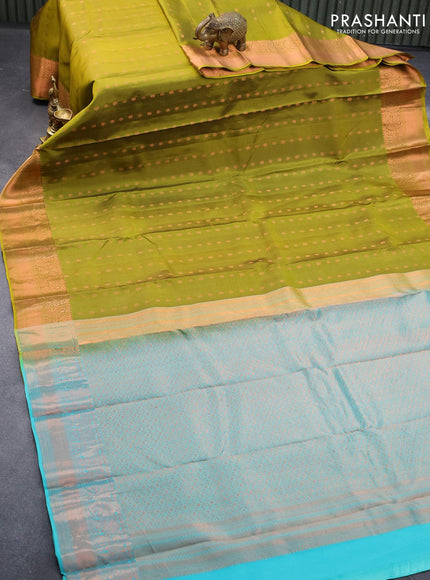 Pure kanjivaram silk saree mehendi green and teal blue with allover copper zari woven butta weaves and copper zari woven border