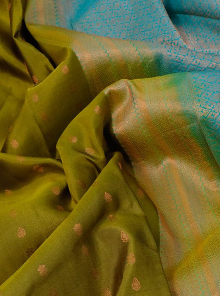 Pure kanjivaram silk saree mehendi green and teal blue with allover copper zari woven butta weaves and copper zari woven border