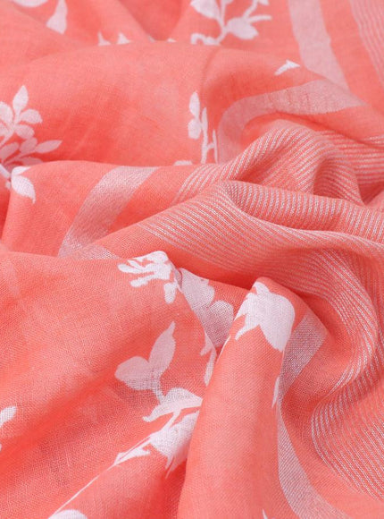 Pure linen saree peach orange with allover floral prints and silver zari woven piping border