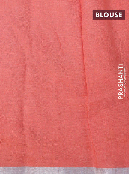 Pure linen saree peach orange with allover floral prints and silver zari woven piping border