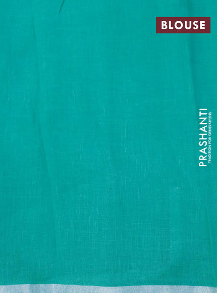 Pure linen saree teal blue with allover zig zag prints and silver zari woven piping border