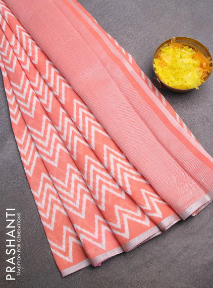 Pure linen saree peach orange with allover zig zag prints and silver zari woven piping border