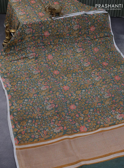 Pure linen saree sap green with allover kalamkari prints and silver zari woven piping border