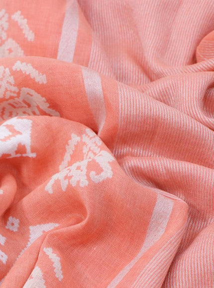 Pure linen saree peach orange with patola prints and silver zari woven piping border