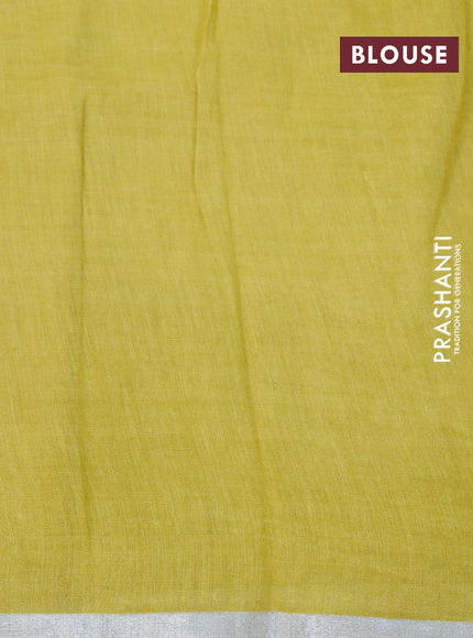 Pure linen saree lime yellow with allover floral prints and silver zari woven piping border