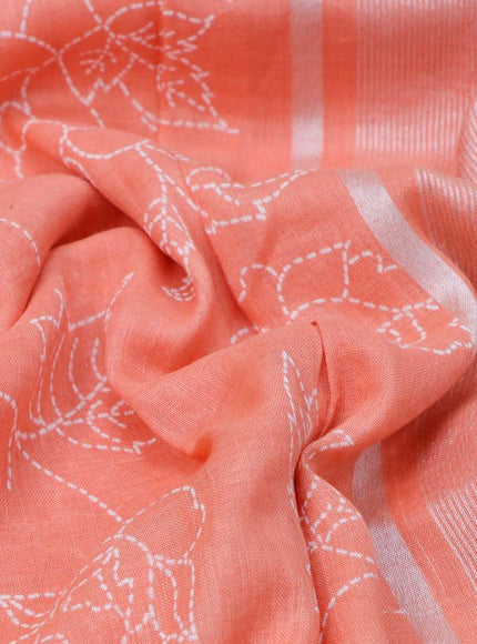 Pure linen saree peach orange with allover prints and silver zari woven piping border