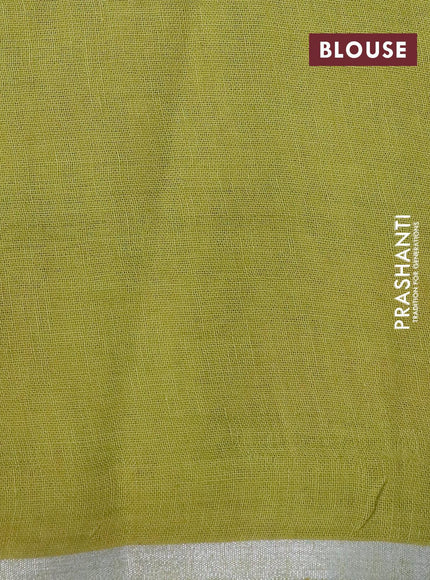 Pure linen saree lime green with allover floral prints and silver zari woven piping border