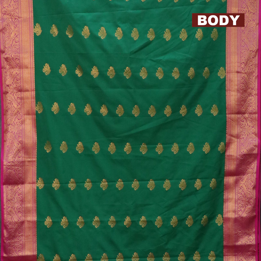 Semi kanjivaram silk saree green and pink with floral zari woven buttas and peacock zair woven korvai border