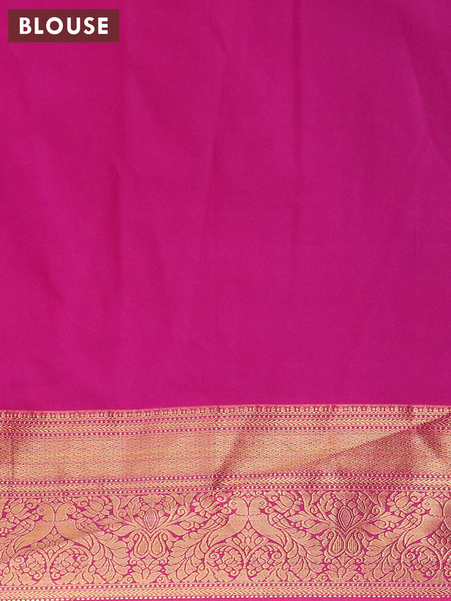 Semi kanjivaram silk saree green and pink with floral zari woven buttas and peacock zair woven korvai border