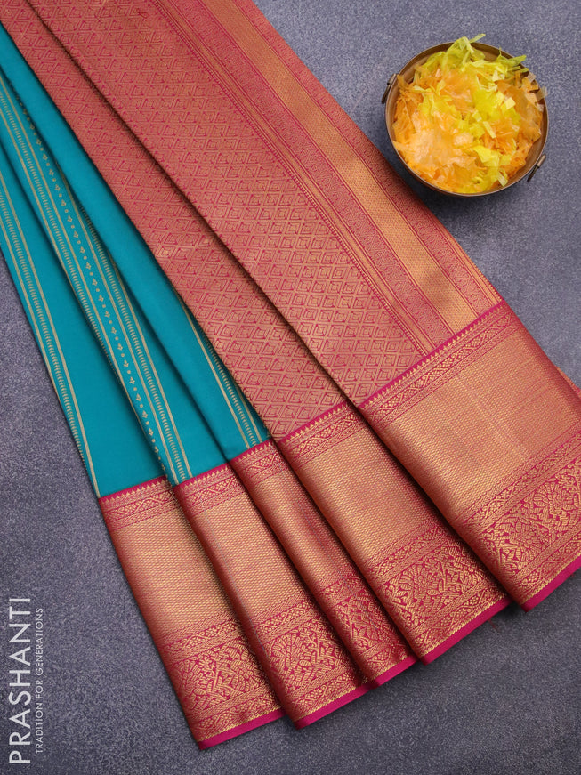 Semi kanjivaram silk saree teal green shade and pink with allover zari weaves & buttas and long zari woven korvai border