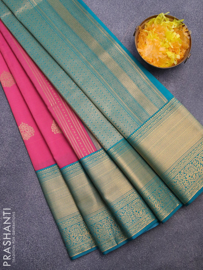 Semi kanjivaram silk saree pink shade and peacock green with allover zari weaves & buttas and long zari woven korvai border