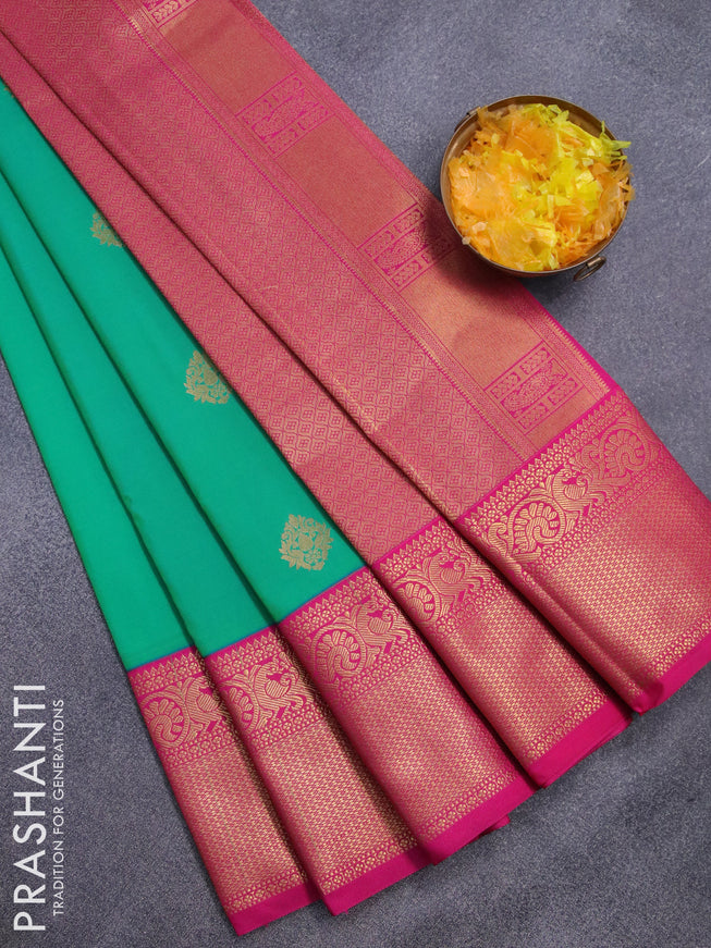 Semi kanjivaram silk saree dual shade of green and pink with zari woven buttas and zari woven korvai border