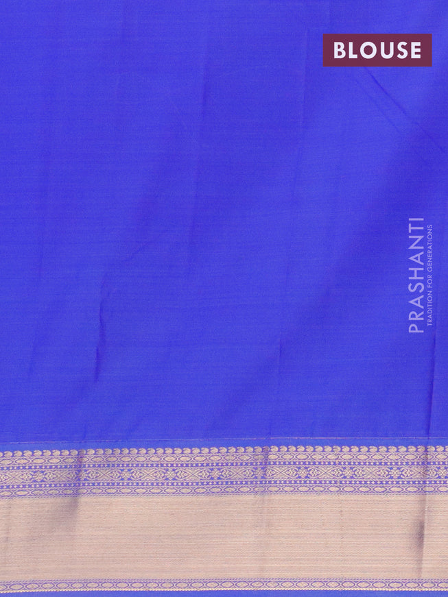 Semi kanjivaram silk saree dual shade of greenish pink and royal blue with allover zari weaves and zari woven korvai border