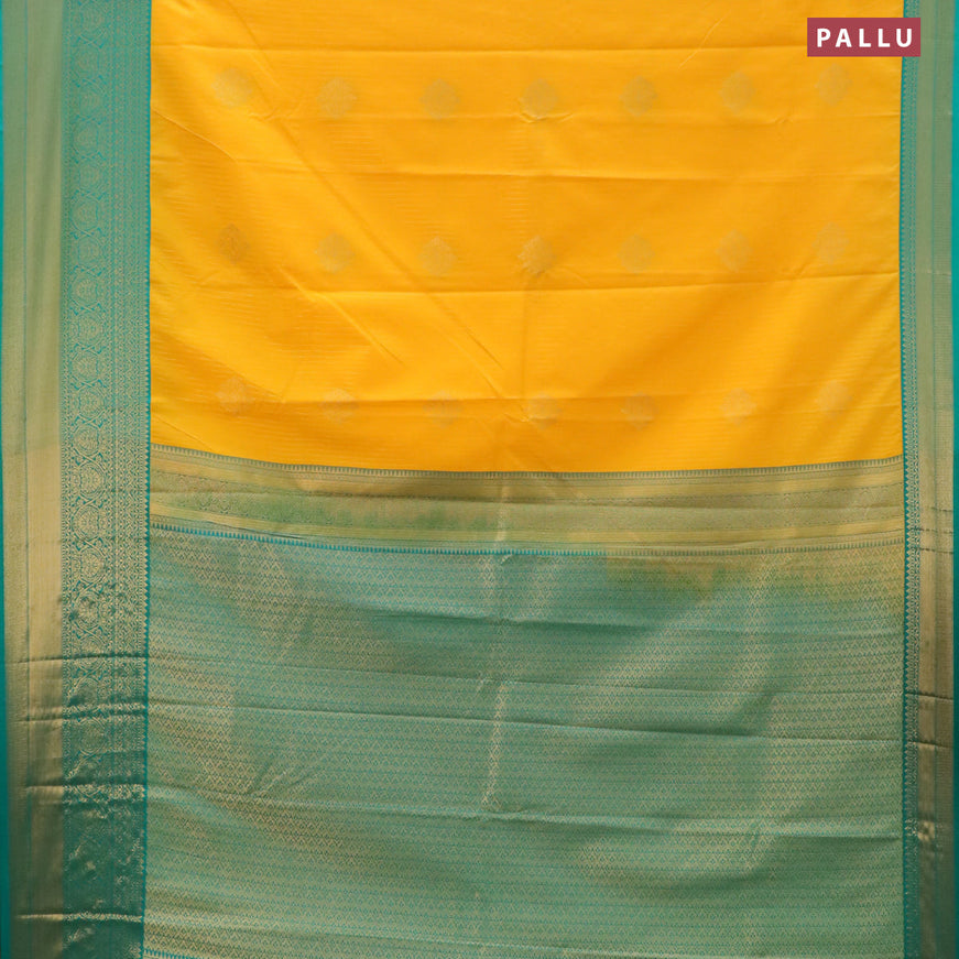 Semi kanjivaram silk saree mango yellow and teal green with allover zari strips & buttas and long zari woven korvai border