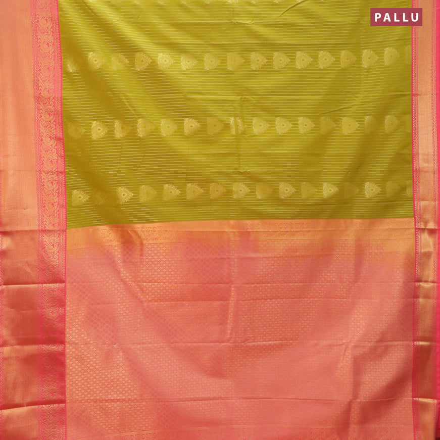 Semi kanjivaram silk saree mehendi green and peach shade with allover zari stripes & buttas and annam zari woven korvai border