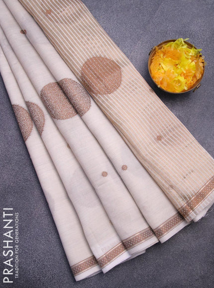 Semi raw silk saree cream with thread & zari woven buttas and woven border