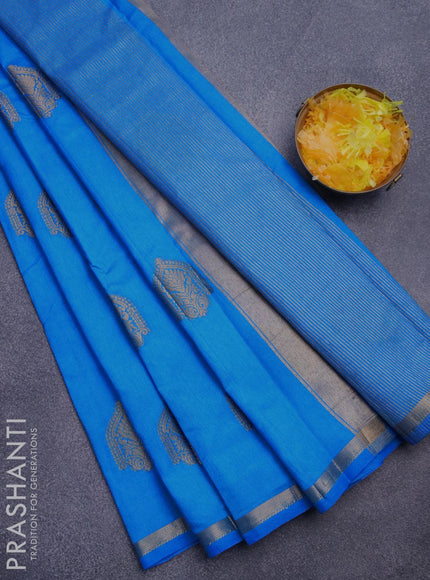 Semi raw silk saree cs blue with zari woven buttas and small zari woven border