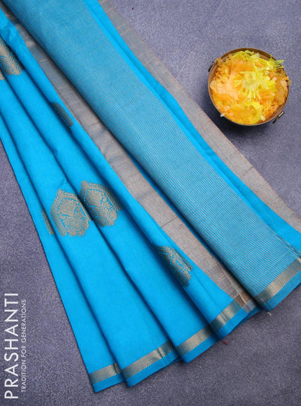 Semi raw silk saree teal blue with zari woven buttas and small zari woven border