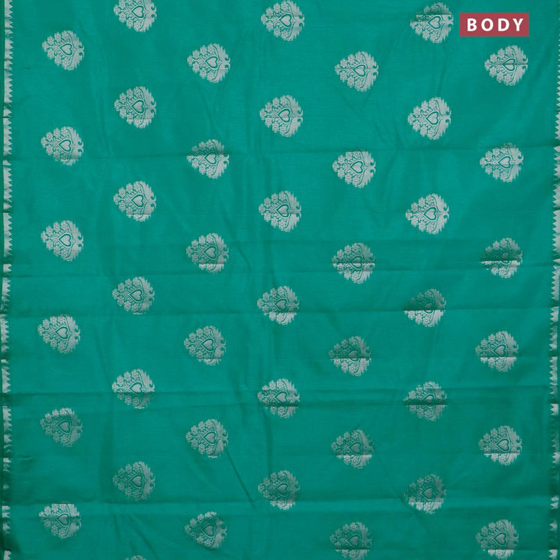 Semi raw silk saree teal green with silver zari woven buttas and silver zari woven border