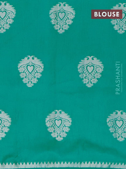 Semi raw silk saree teal green with silver zari woven buttas and silver zari woven border